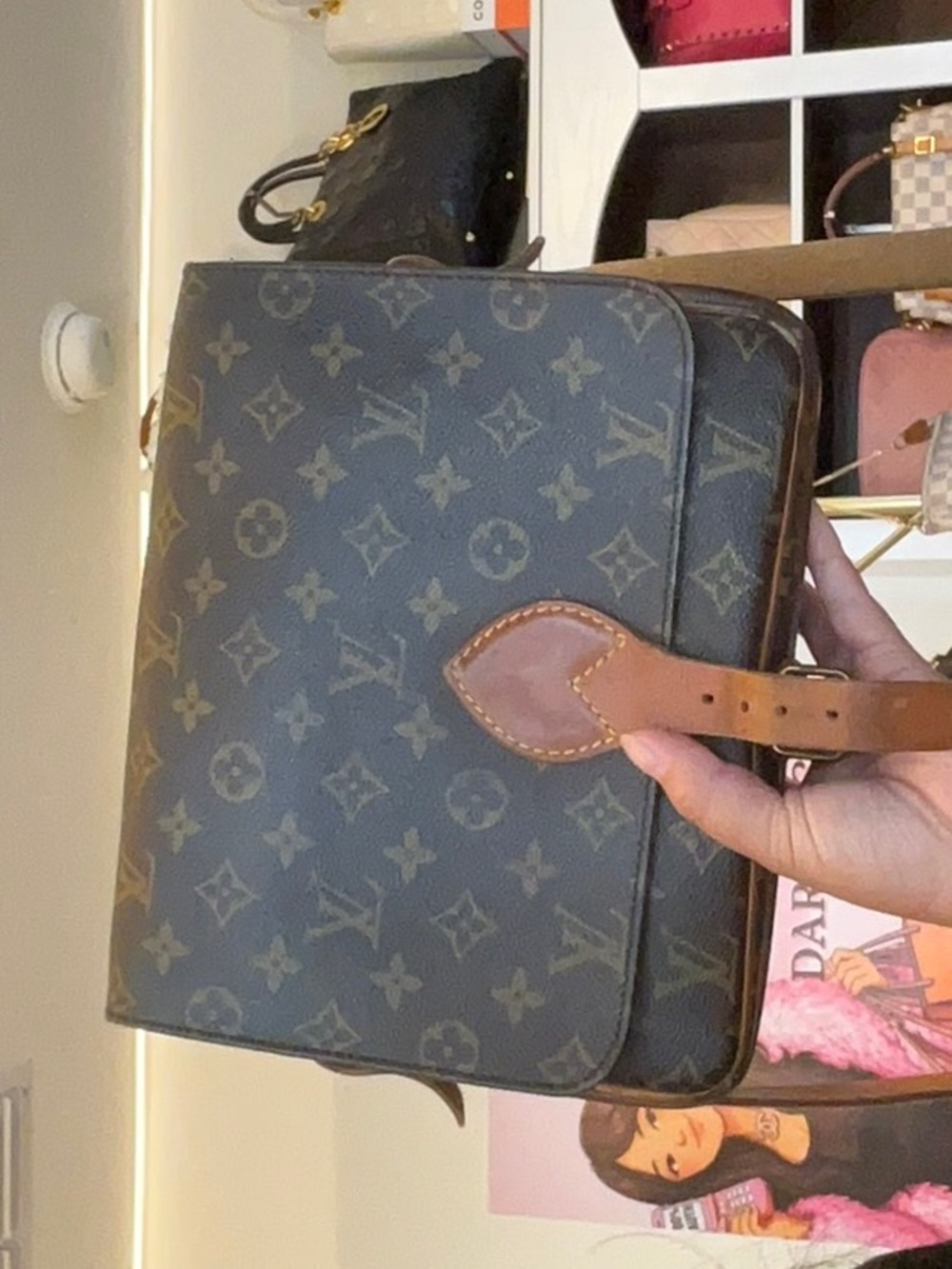 25. LV mono sold as is Desc in live no cancel/returns